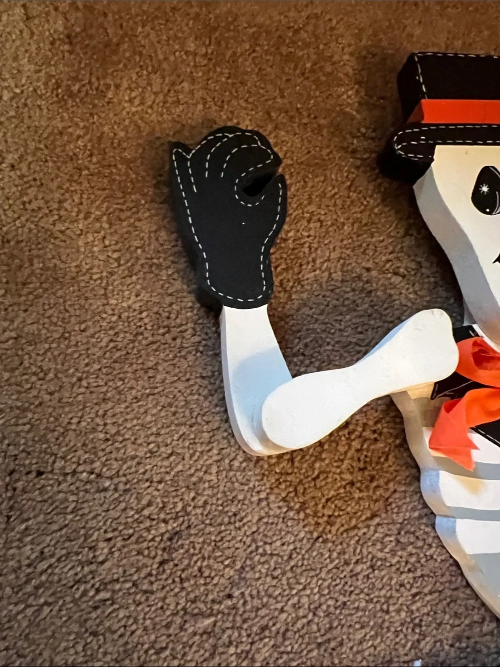 Skeleton Wood Decor with Orange Accents